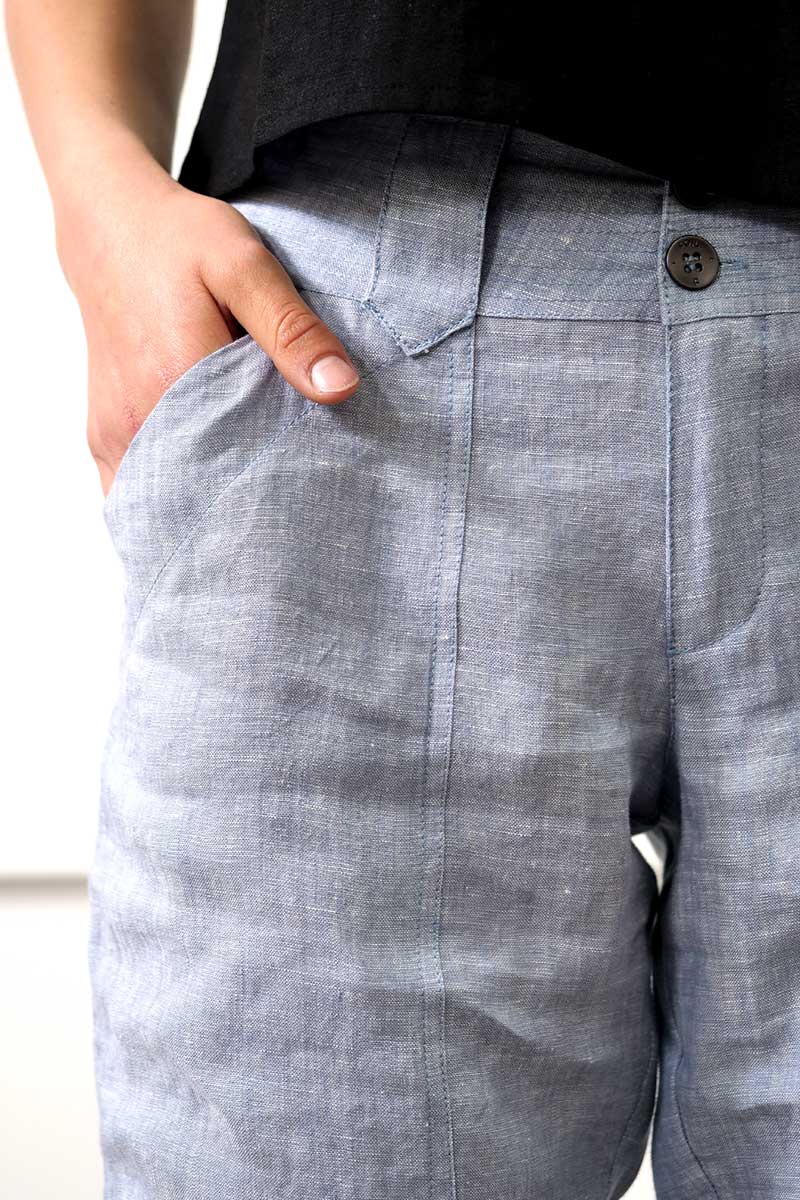 detail view of the front waist on the Foil The Works Pant in Chambray Hash