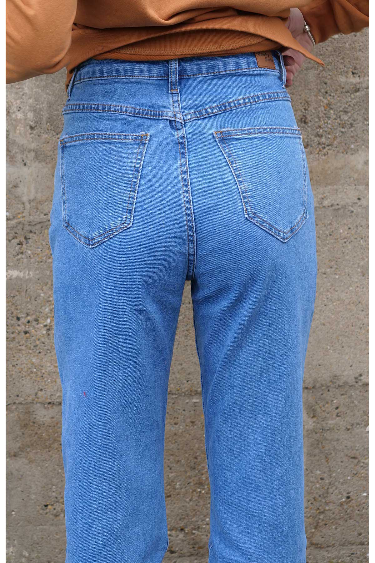 Raw hem Stretch Mum Jean by Country denim with back pockets and label.
