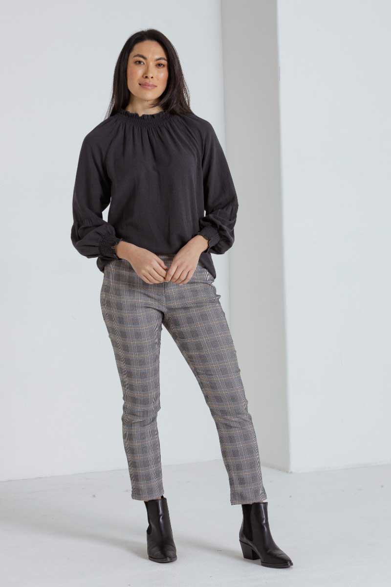 Model wearing the Marco Polo Check Dress Pants 7/8 Stretch