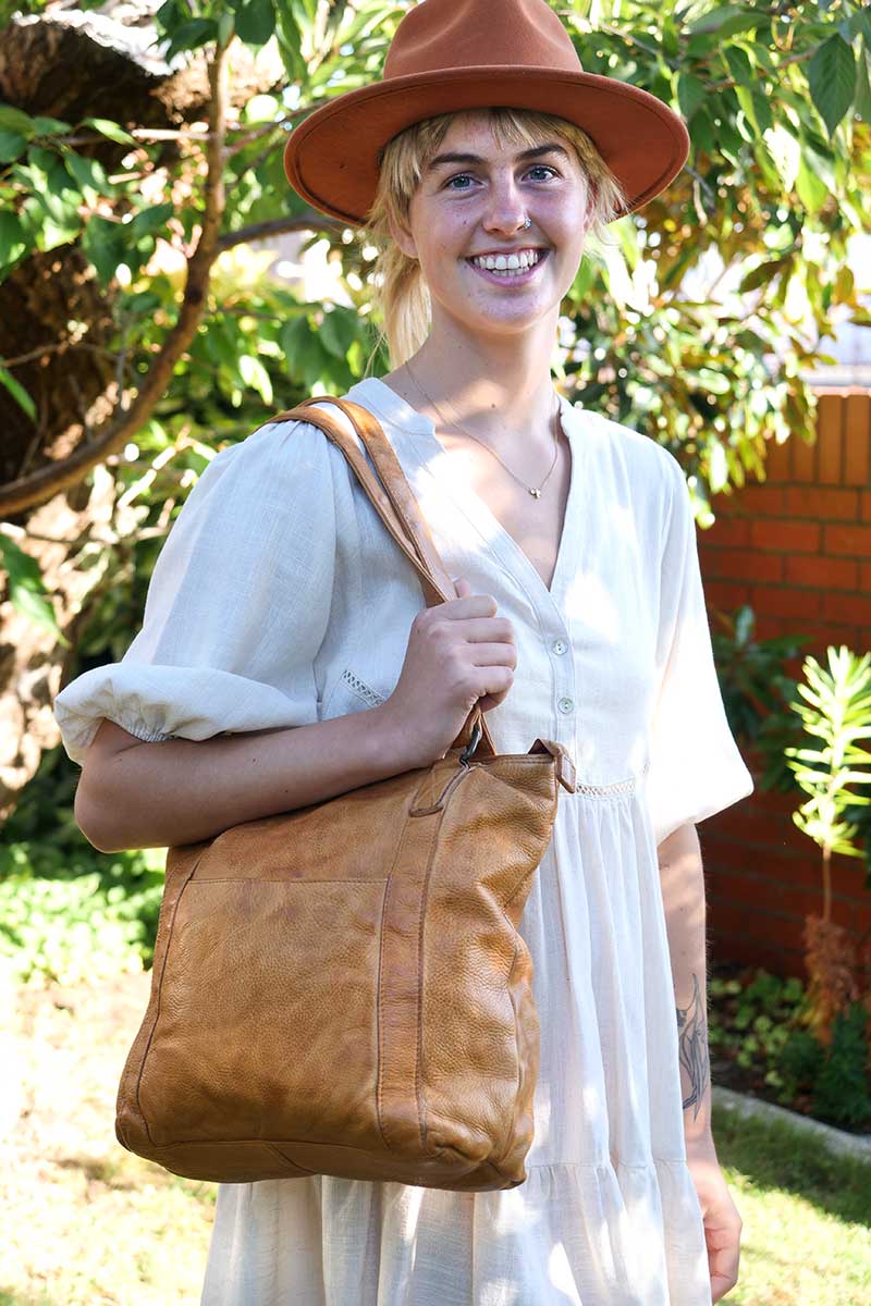 model with the Rugged Hide Leather Tote Bag - Adelaide Tan